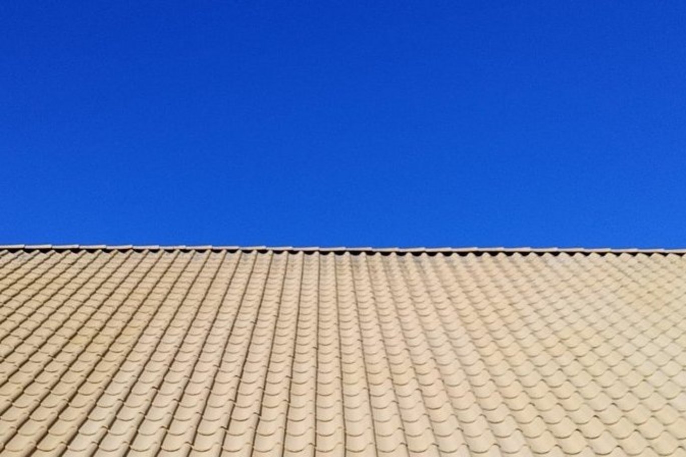 Photo of roof and blue sky